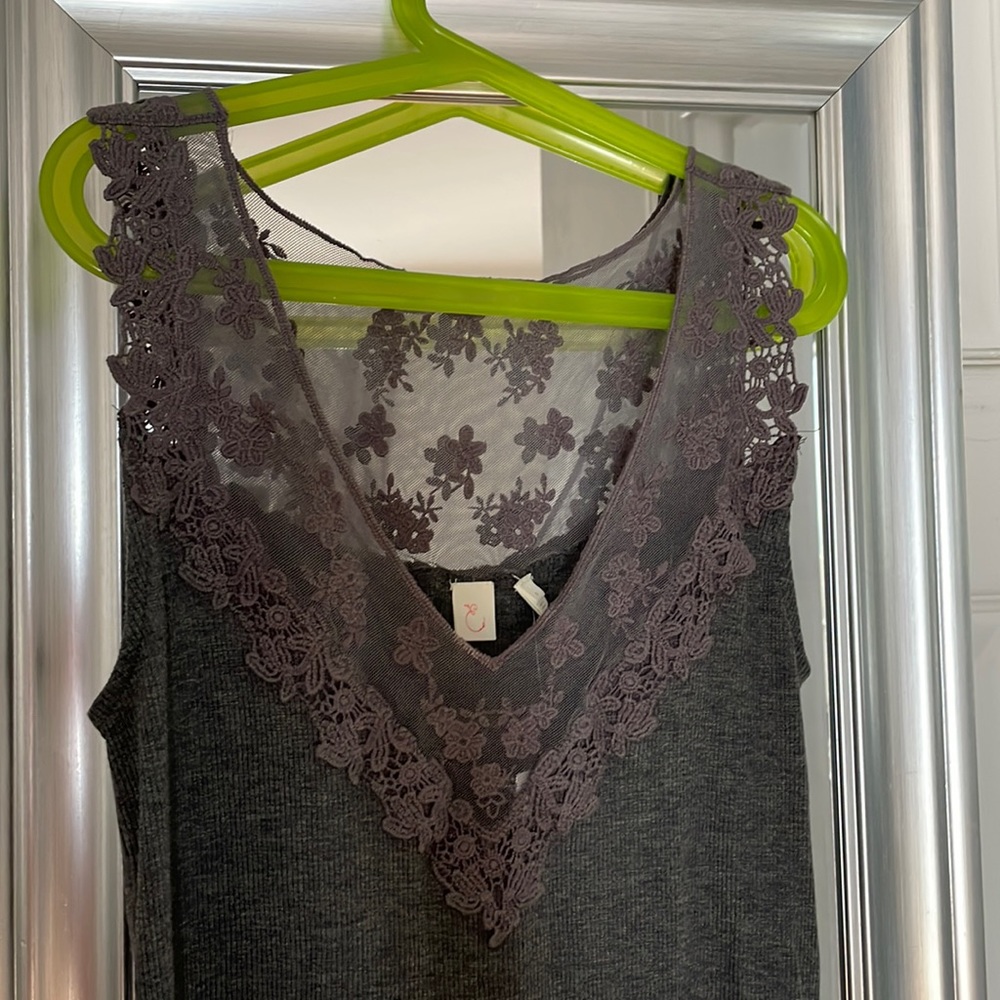 Tank top with upper lace design.